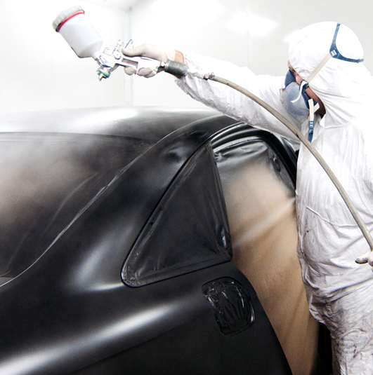 Spray painting a car